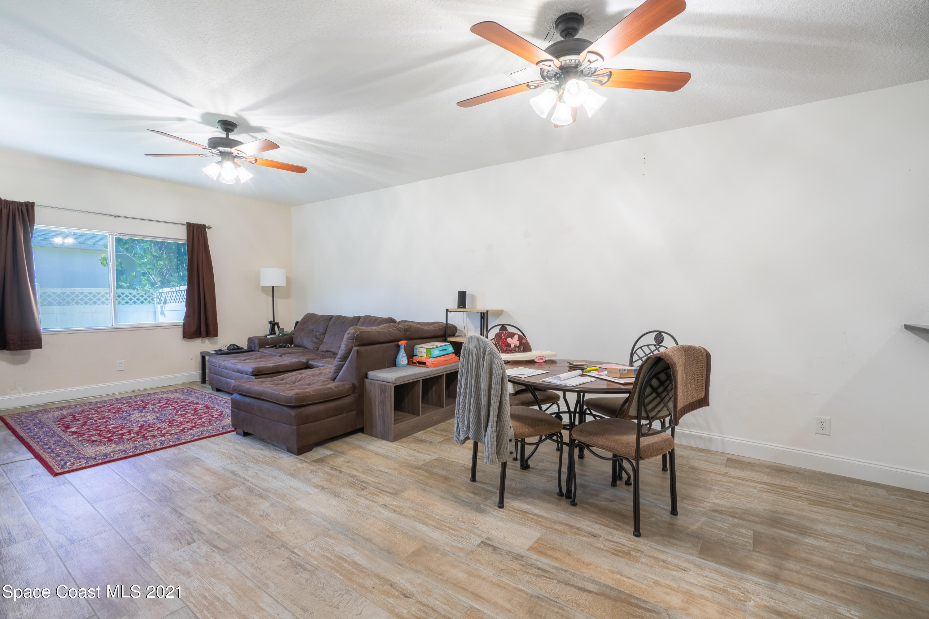 3758 Chambers Lane, Unit 7 Cocoa, FL 32926 - Photo 7 of 25 Living/Dining