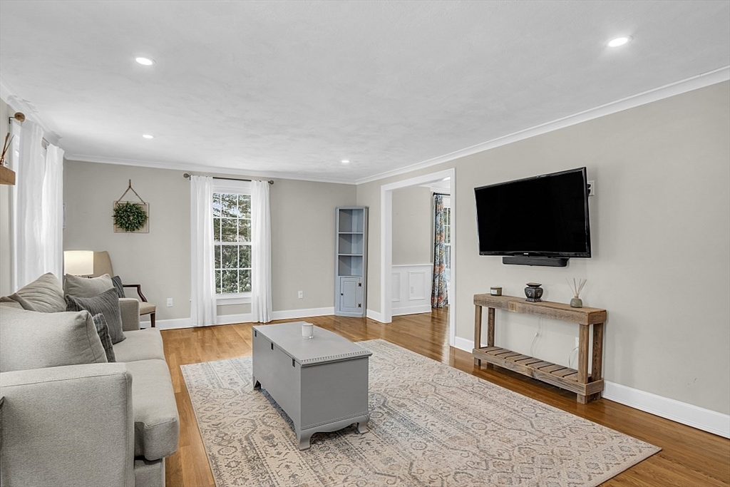 2 Greenbriar Circle Andover, MA 01810 - Photo 14 of 41 a living room with furniture and a flat screen tv