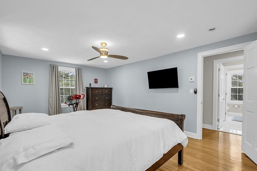 2 Greenbriar Circle Andover, MA 01810 - Photo 19 of 41 a bedroom with a bed and a flat screen tv