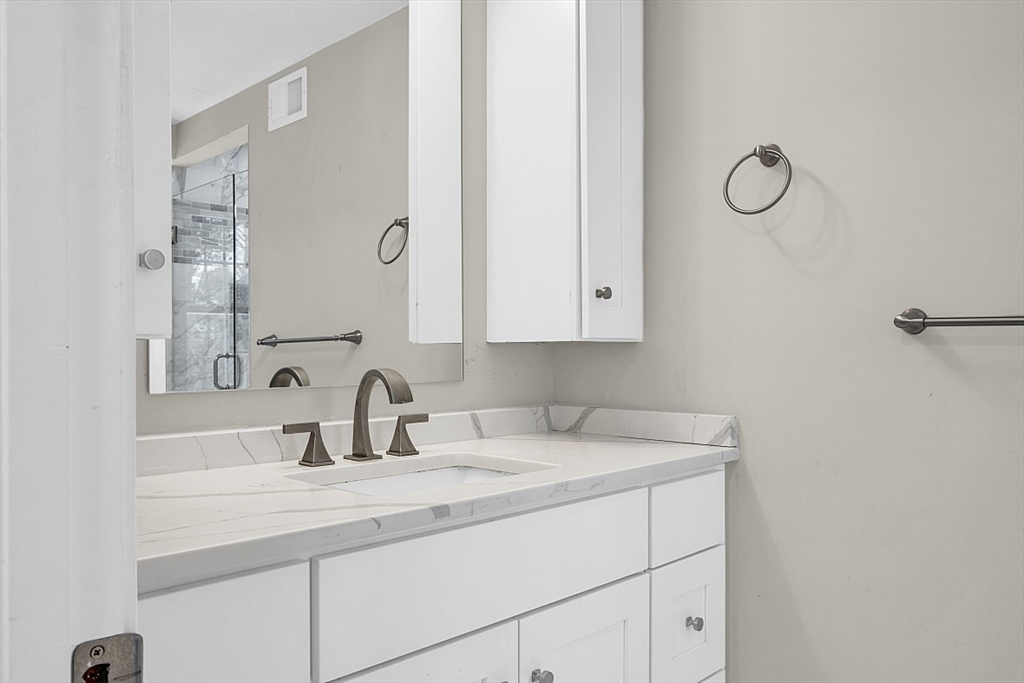 2 Greenbriar Circle Andover, MA 01810 - Photo 22 of 41 a bathroom with a sink and a mirror