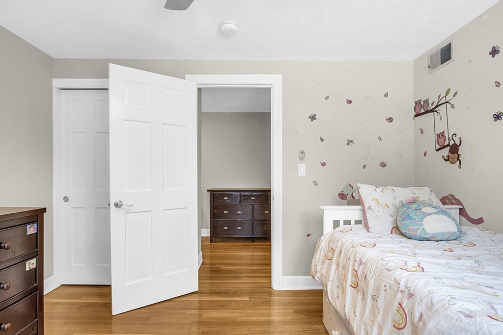 2 Greenbriar Circle Andover, MA 01810 - Photo 26 of 41 a bedroom with a bed and a closet