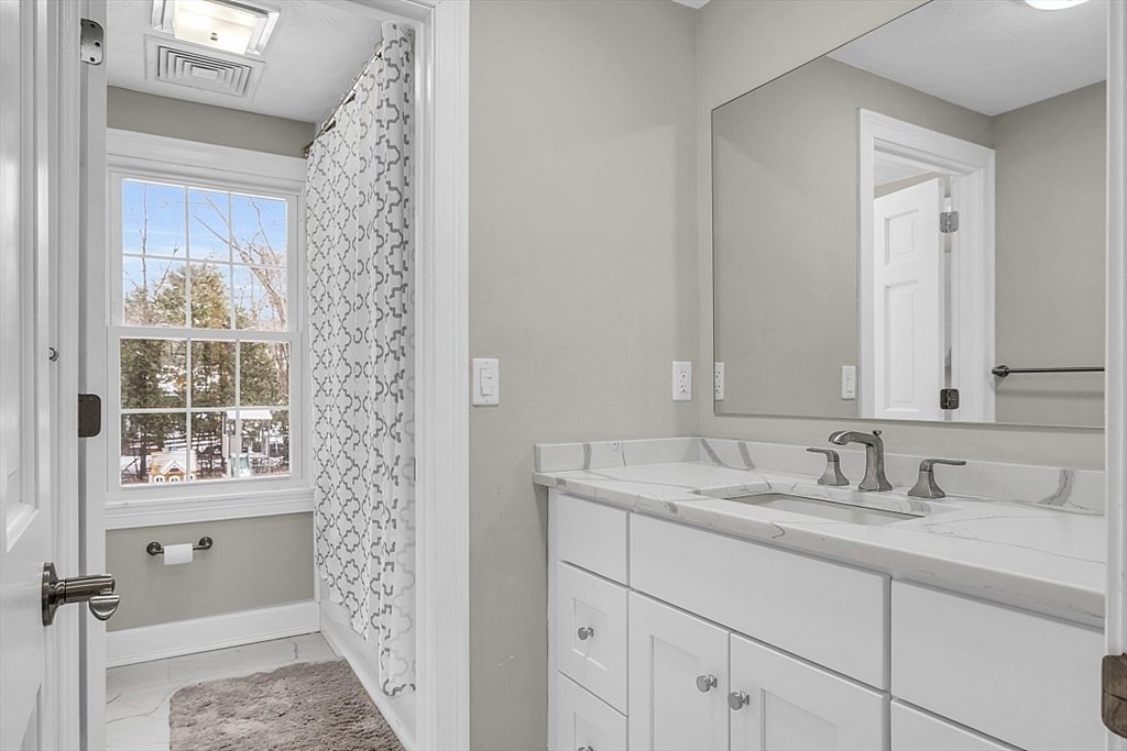 2 Greenbriar Circle Andover, MA 01810 - Photo 31 of 41 a bathroom with a sink and a mirror