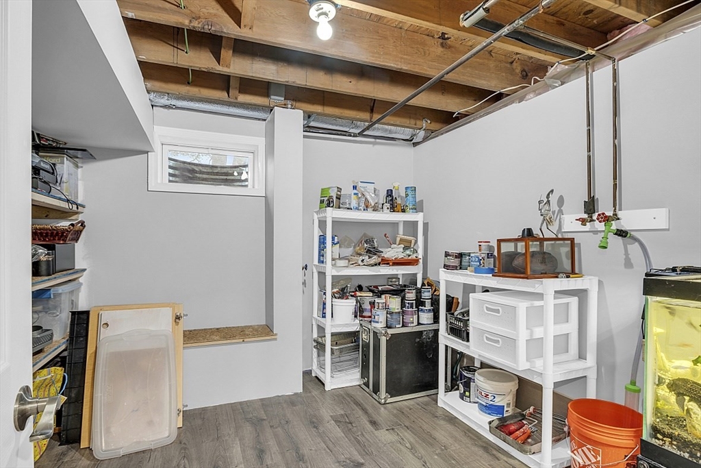 2 Greenbriar Circle Andover, MA 01810 - Photo 39 of 41 a view of a storage & utility room with fridge and wooden floor