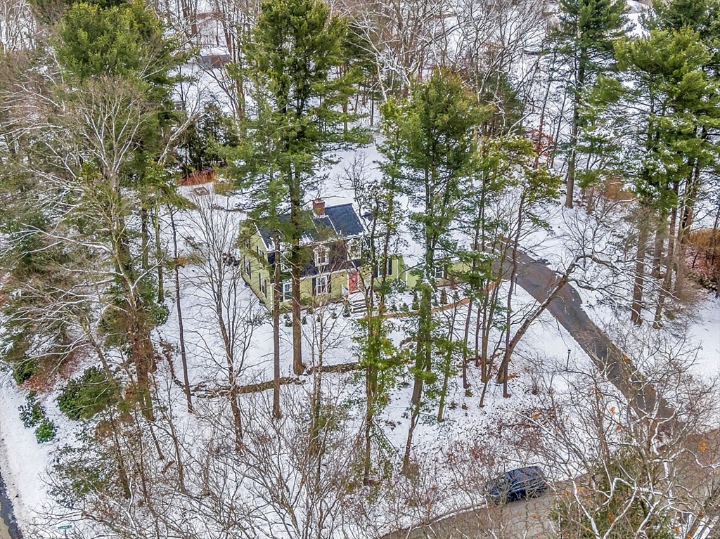 2 Greenbriar Circle Andover, MA 01810 - Photo 41 of 41 a backyard of a house with lots of trees