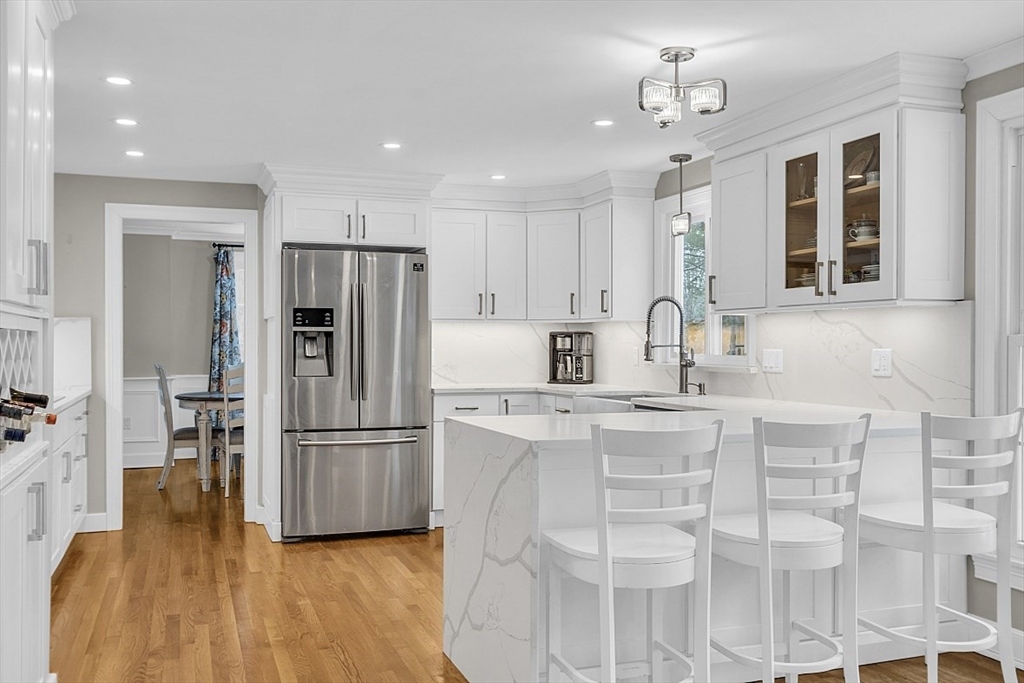 2 Greenbriar Circle Andover, MA 01810 - Photo 8 of 41 a kitchen with cabinets and stainless steel appliances