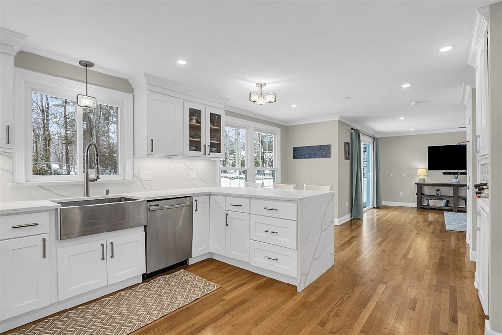 2 Greenbriar Circle Andover, MA 01810 - Photo 10 of 41 a large kitchen with cabinets and wooden floor