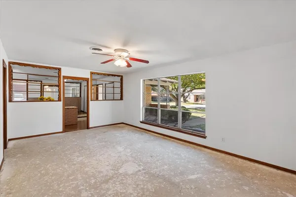 an empty room with windows