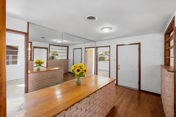 a view of a living room and bathroom