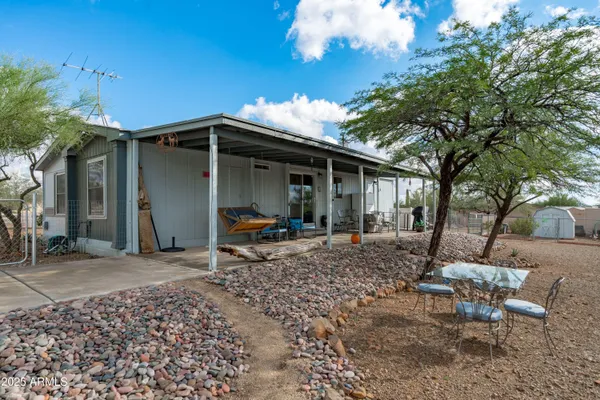 a view of a porch with furniture