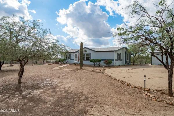 a view of a house with a snow
