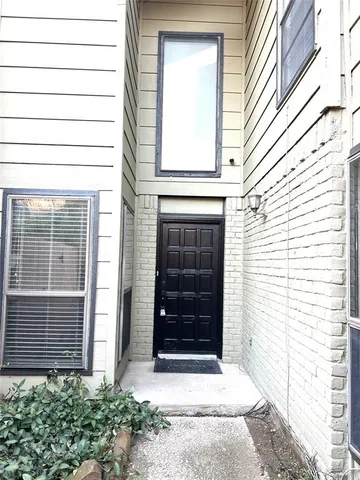 a front view of a house with a window
