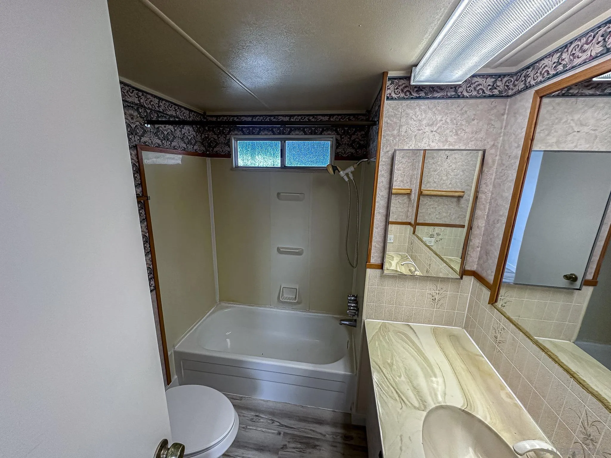 2400 Alpine Boulevard, Unit 17 Alpine, CA 91901 - Photo 11 of 22 a bathroom with a sink toilet and shower