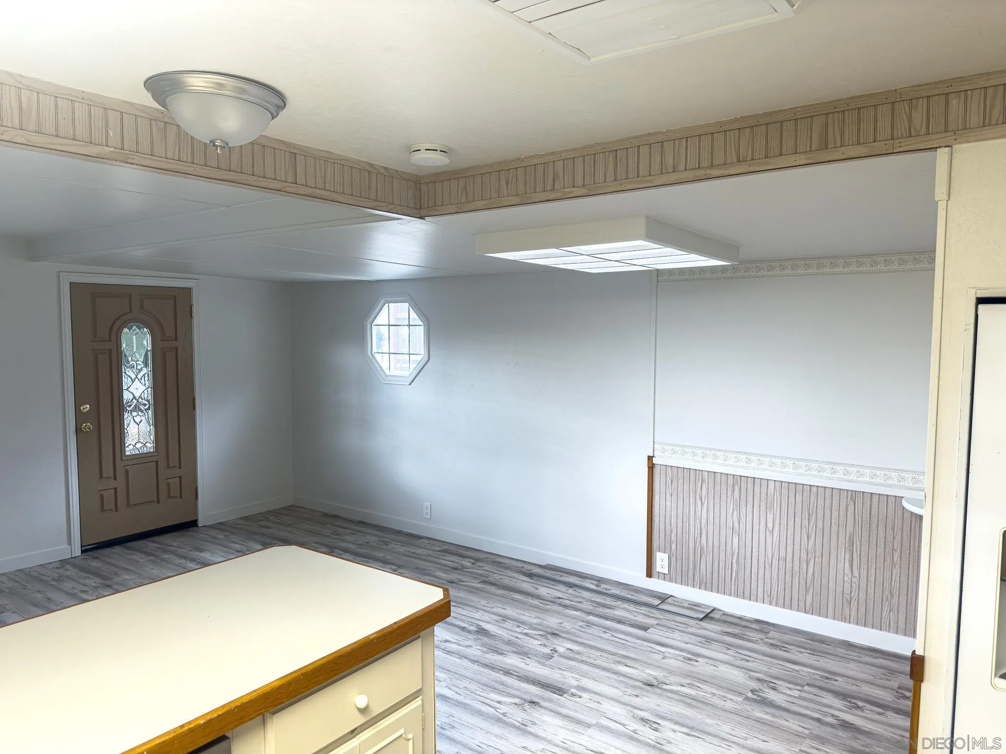 2400 Alpine Boulevard, Unit 17 Alpine, CA 91901 - Photo 5 of 22 a view of empty room with wooden floor