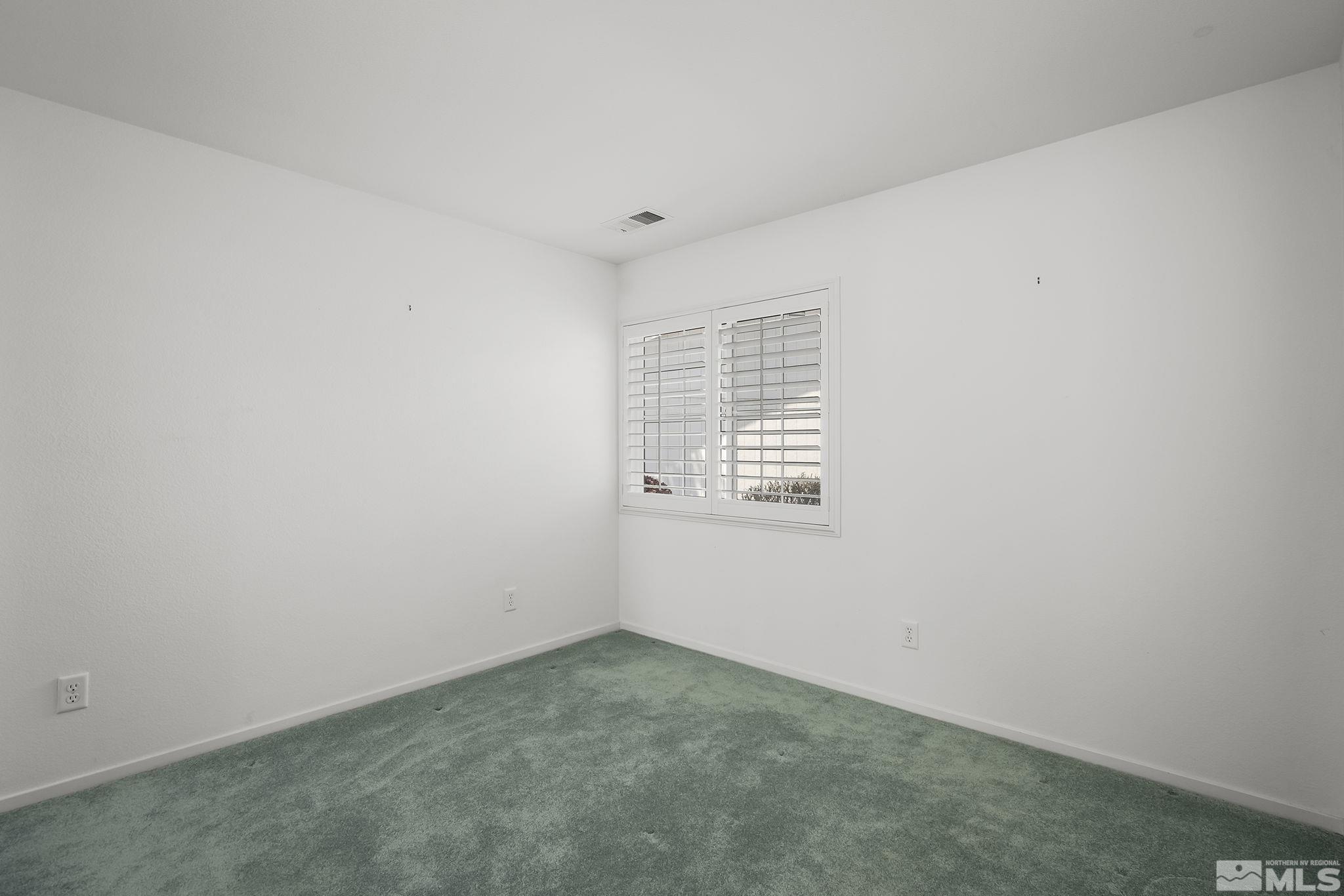1095 Conifer Drive Minden, NV 89423 - Photo 12 of 19 an empty room with a window