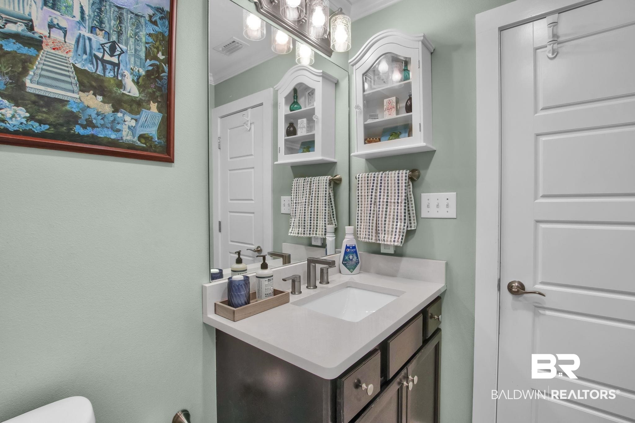 203 Lakefront Circle Summerdale, AL 36580 - Photo 49 of 69 Bathroom with crown molding, vanity, and toilet
