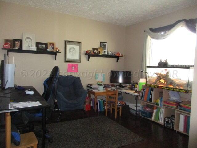 4243 Camp Lane Amarillo, TX 79110 - Photo 4 of 17 a workspace with furniture and window
