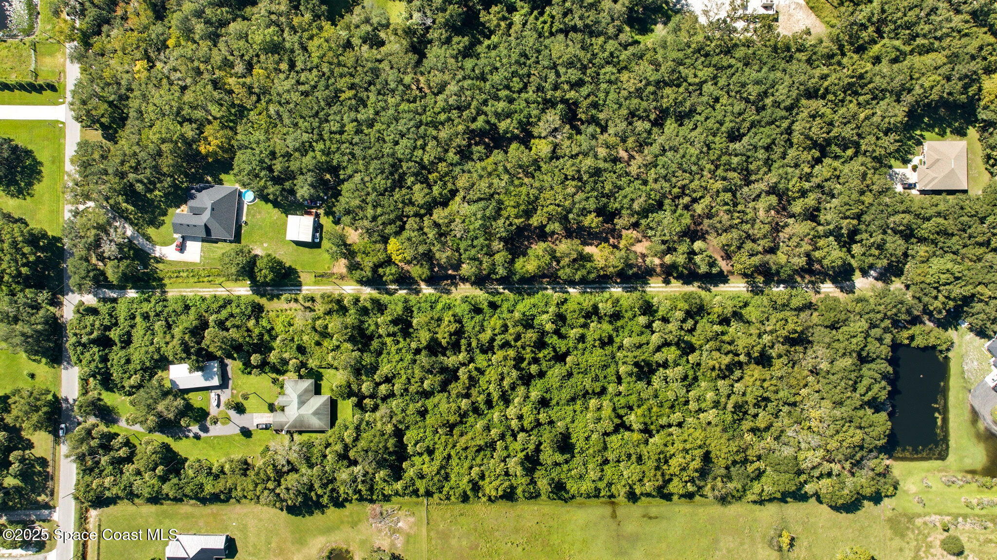 4110 Hampton Lane Mims, FL 32754 - Photo 10 of 26 a bird view of a house with a yard