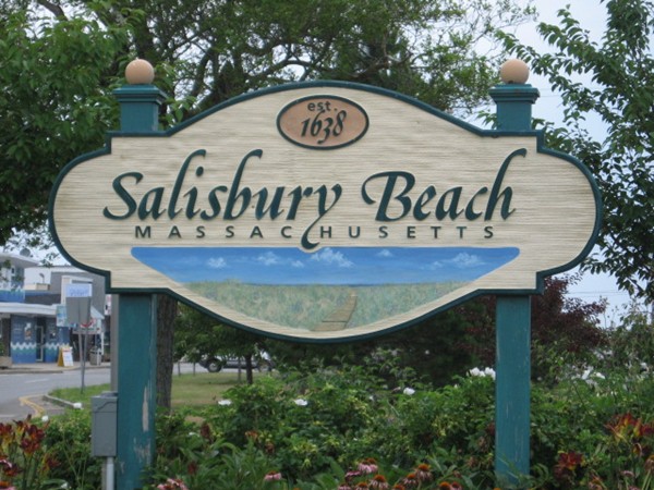117 Beach Road Salisbury, MA 01952 - Photo 8 of 10 a sign that is on a wooden wall