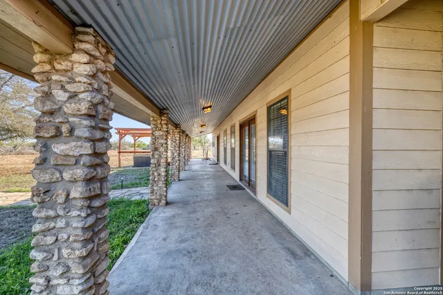 a view of a big yard with lots of green space and mountain view
