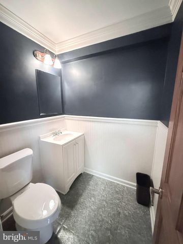 a room with water heater and stairs