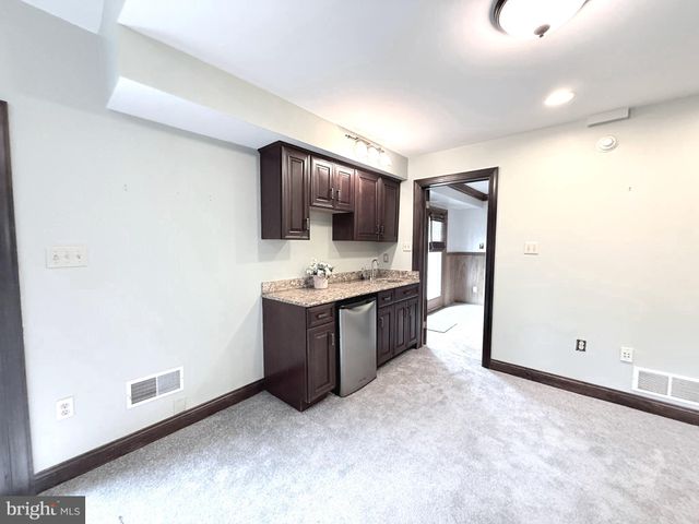 a view of a backyard with a garden