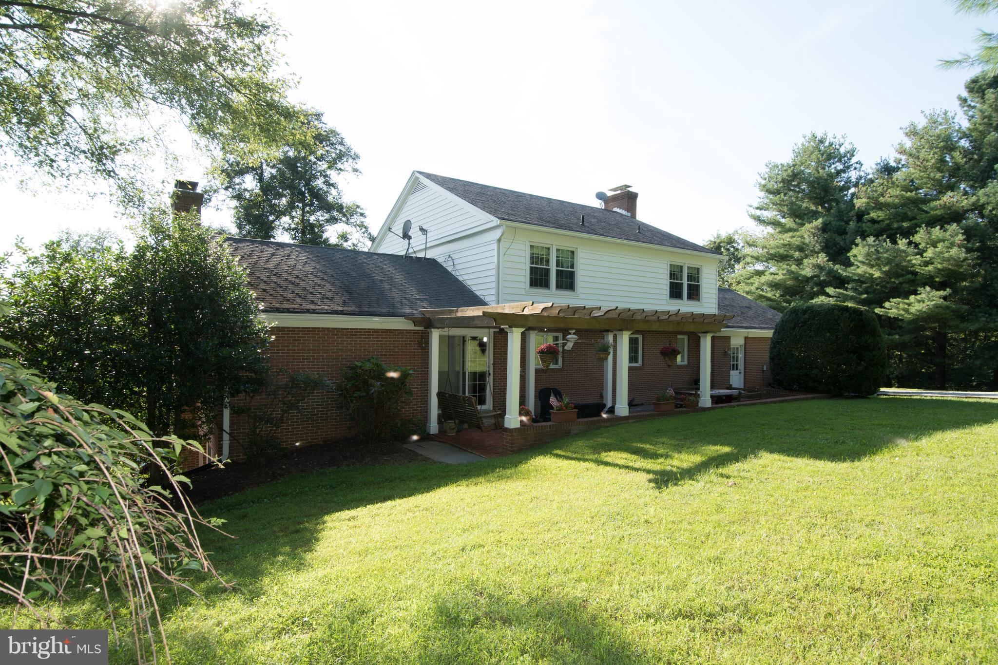 39501 Digges Valley Road Leesburg, VA 20175 - Photo 29 of 30 Great brick patio with Pergola