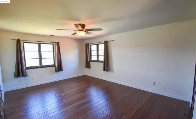a view of swimming pool from a balcony