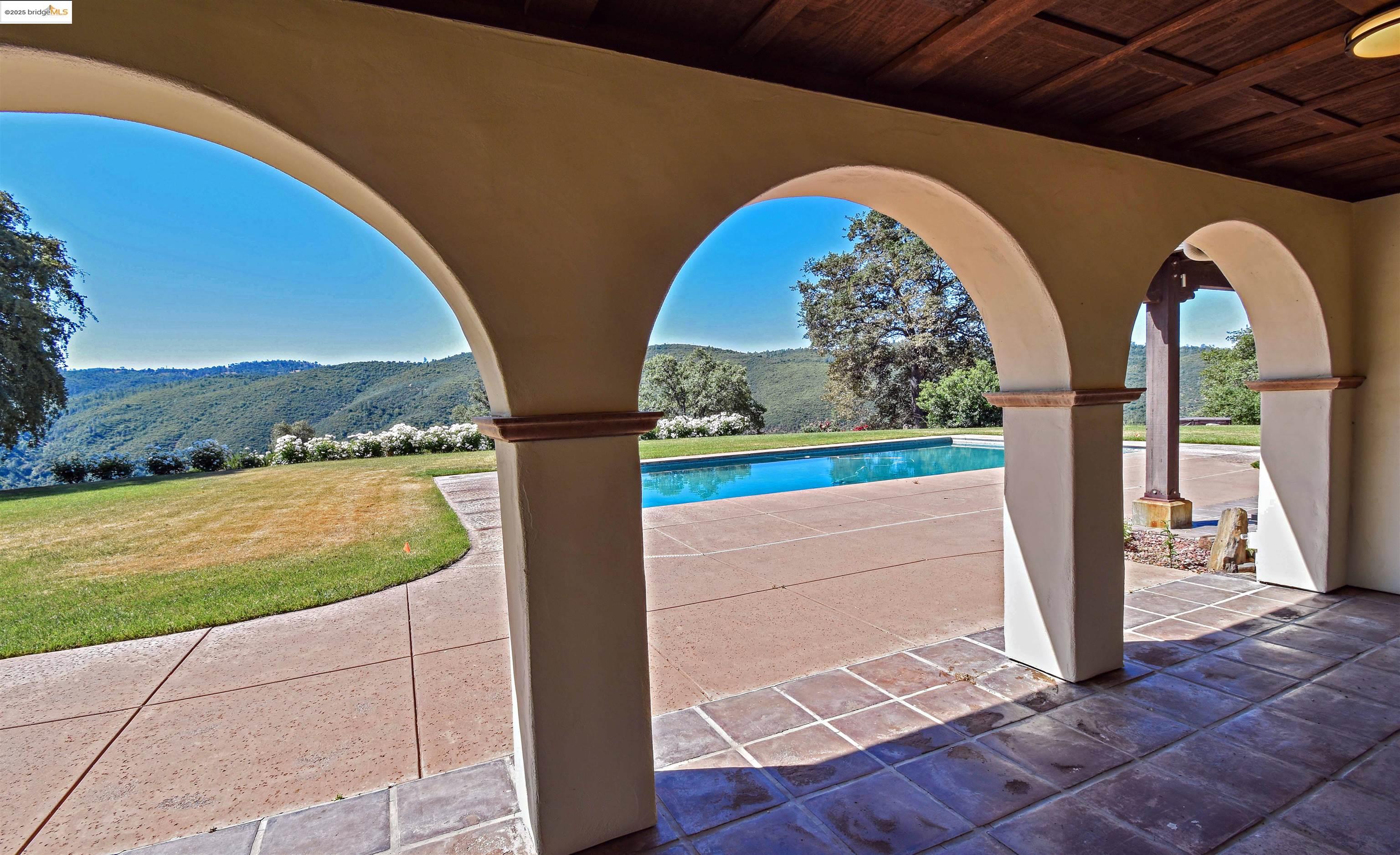26255 Powell Ranch Road Sonora, CA 95370 - Photo 28 of 48 a view of swimming pool from a balcony