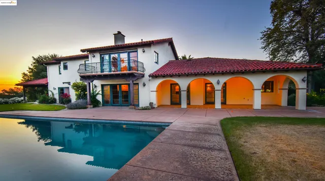 a view of swimming pool from a outdoor space