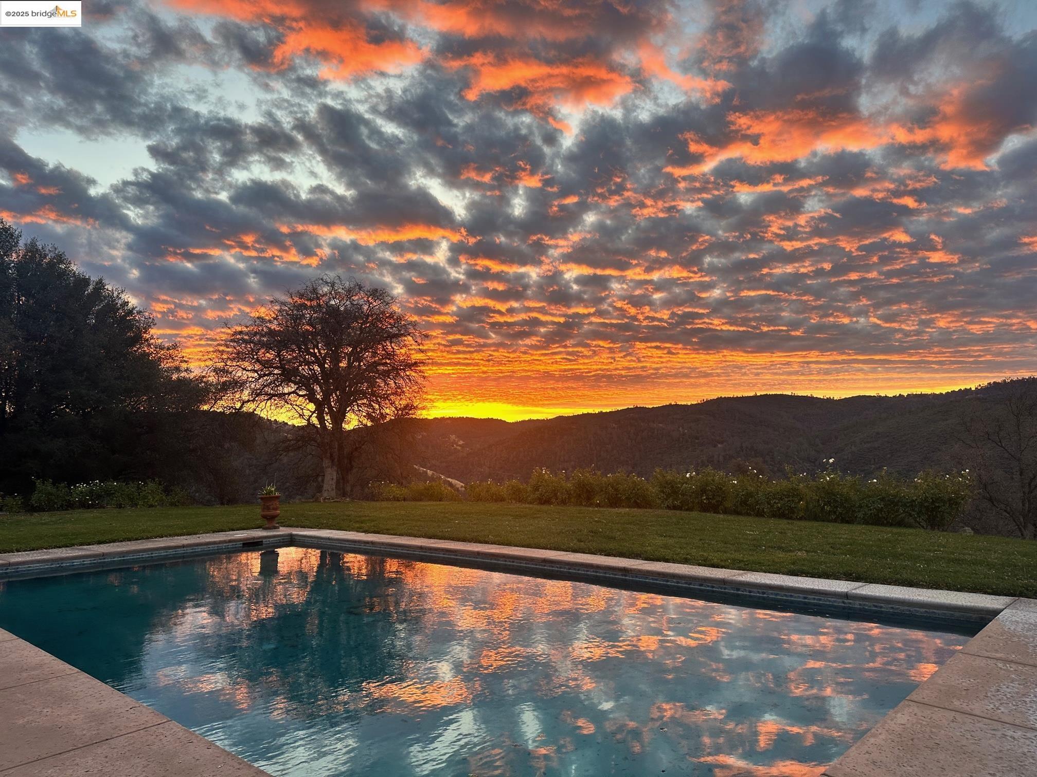 26255 Powell Ranch Road Sonora, CA 95370 - Photo 30 of 48 a view of pool with mountain in the background