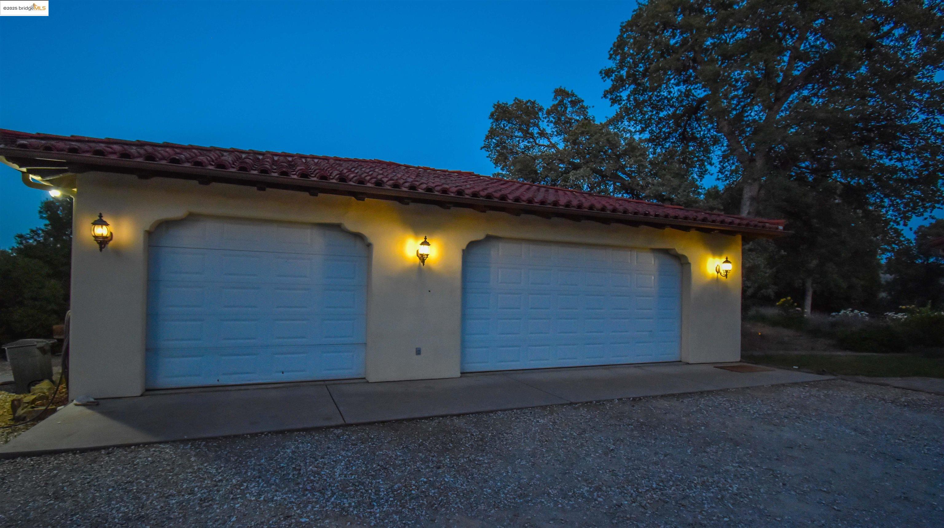 26255 Powell Ranch Road Sonora, CA 95370 - Photo 42 of 48 a front view of a house with a yard