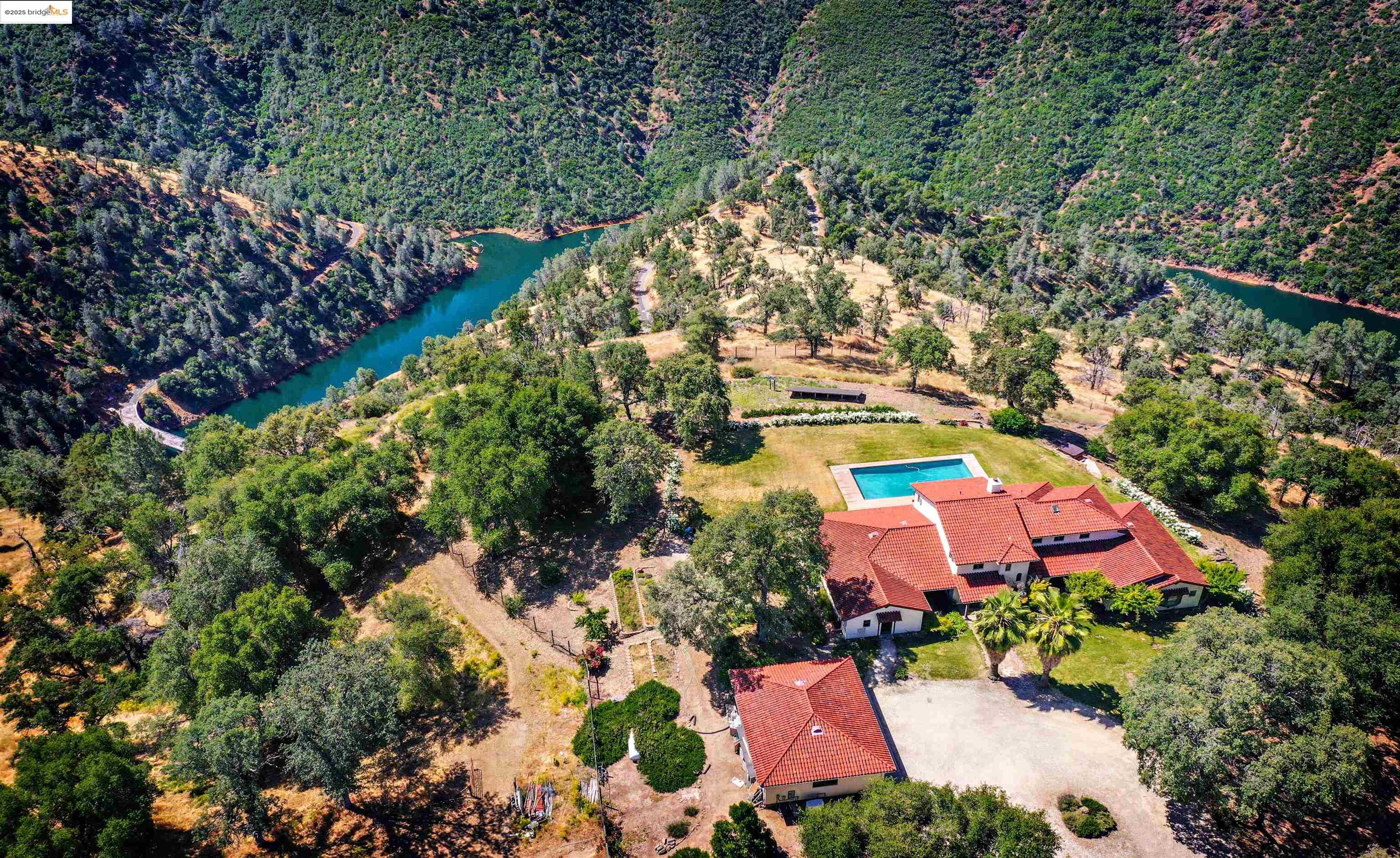 26255 Powell Ranch Road Sonora, CA 95370 - Photo 43 of 48 an aerial view of a house with a yard