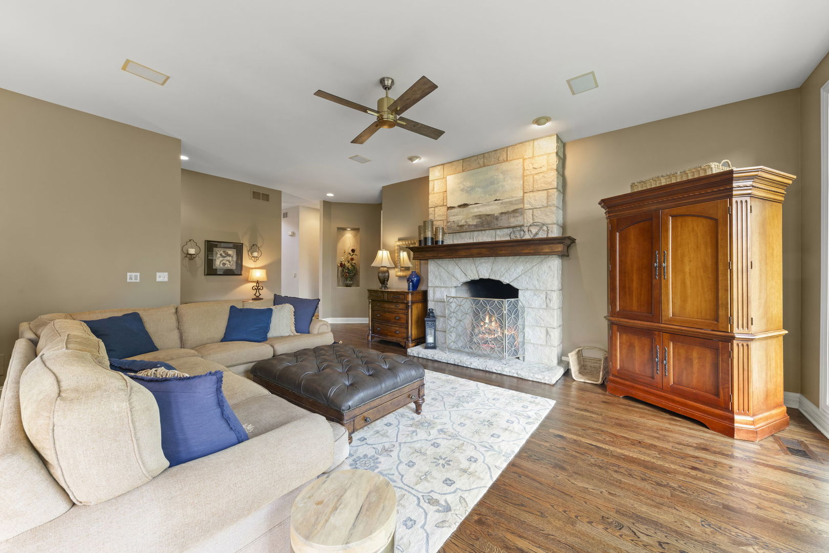 39W114 Fryendall Court Geneva, IL 60134 - Photo 16 of 76 a living room with furniture and a fireplace