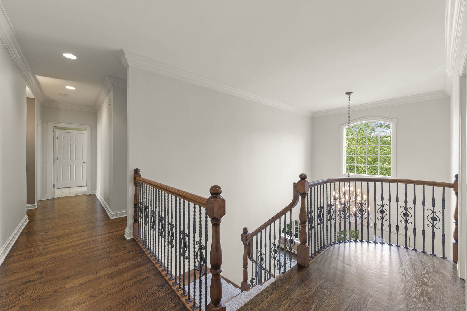 39W114 Fryendall Court Geneva, IL 60134 - Photo 20 of 76 a view of hallway with wooden floor and windows