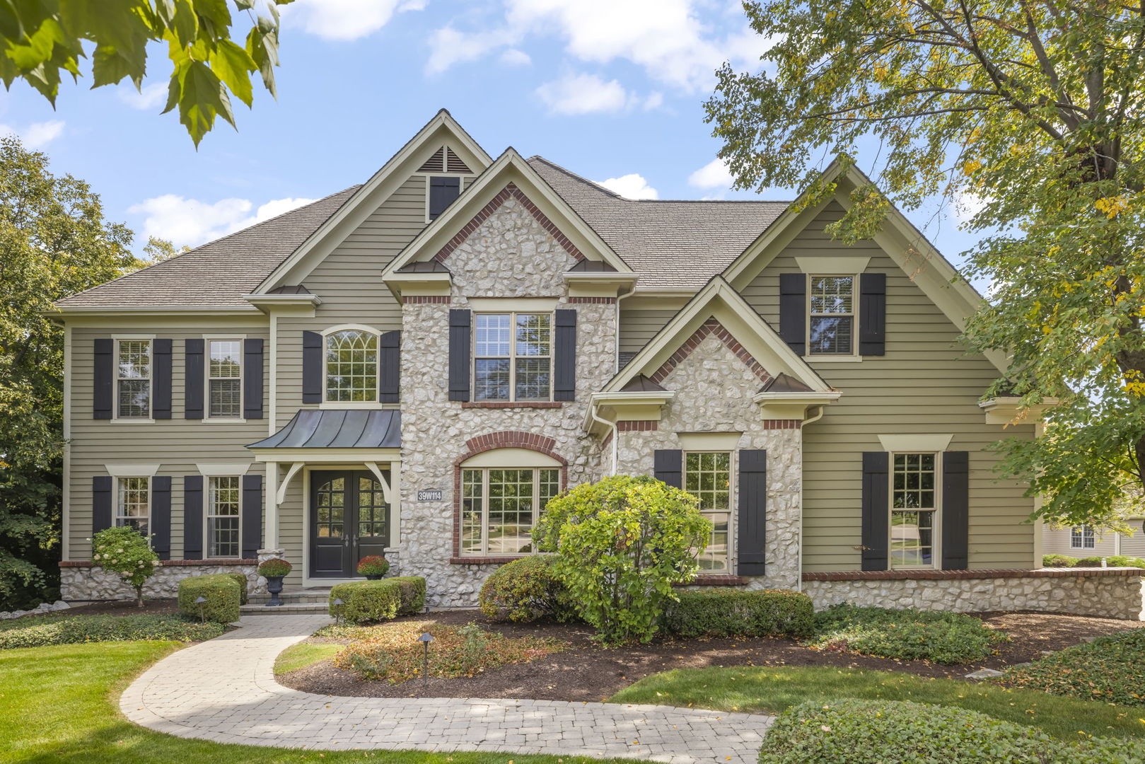 39W114 Fryendall Court Geneva, IL 60134 - Photo 30 of 76 a front view of a house with a yard