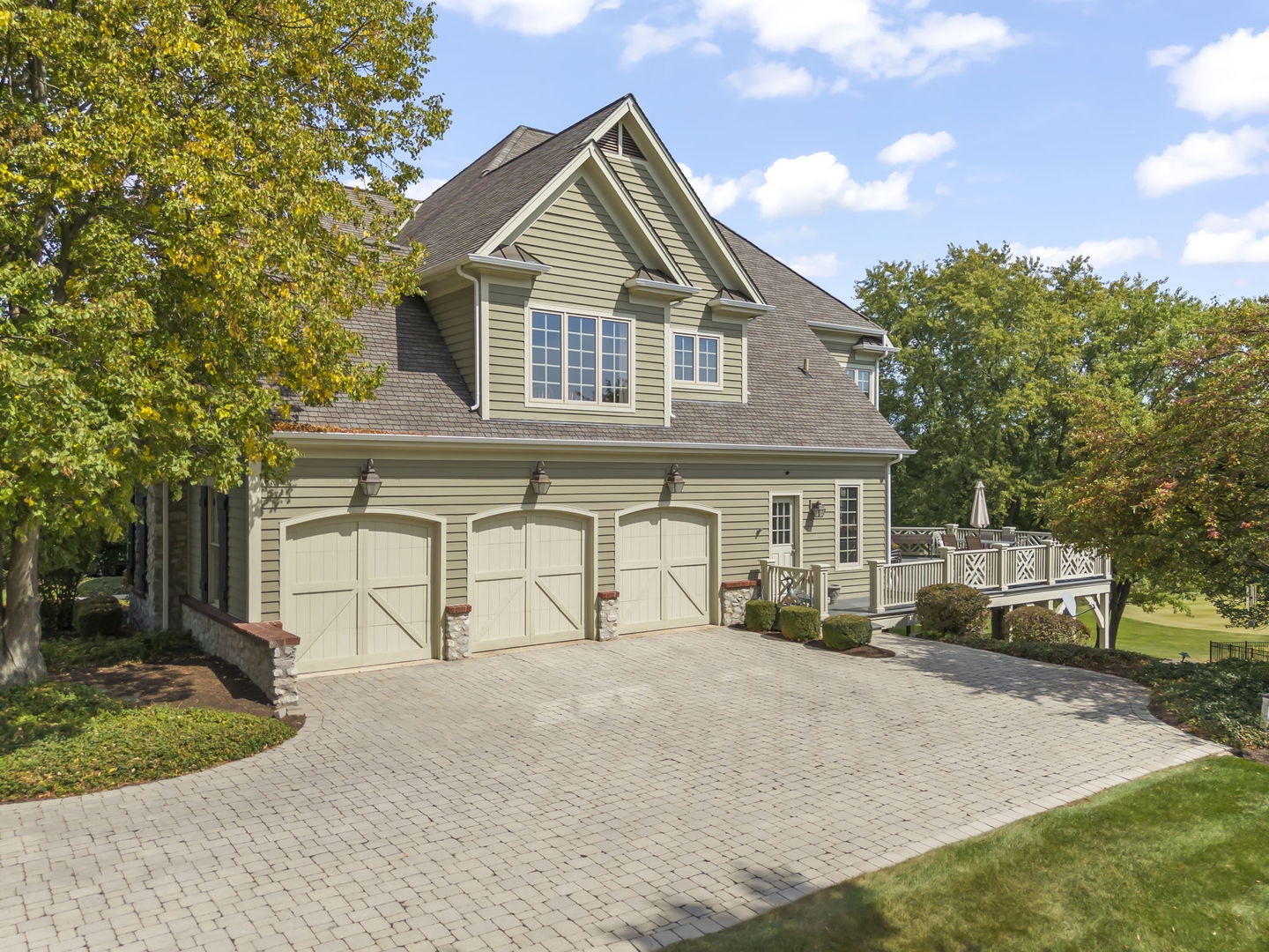 39W114 Fryendall Court Geneva, IL 60134 - Photo 39 of 76 a front view of a house with a yard and garage