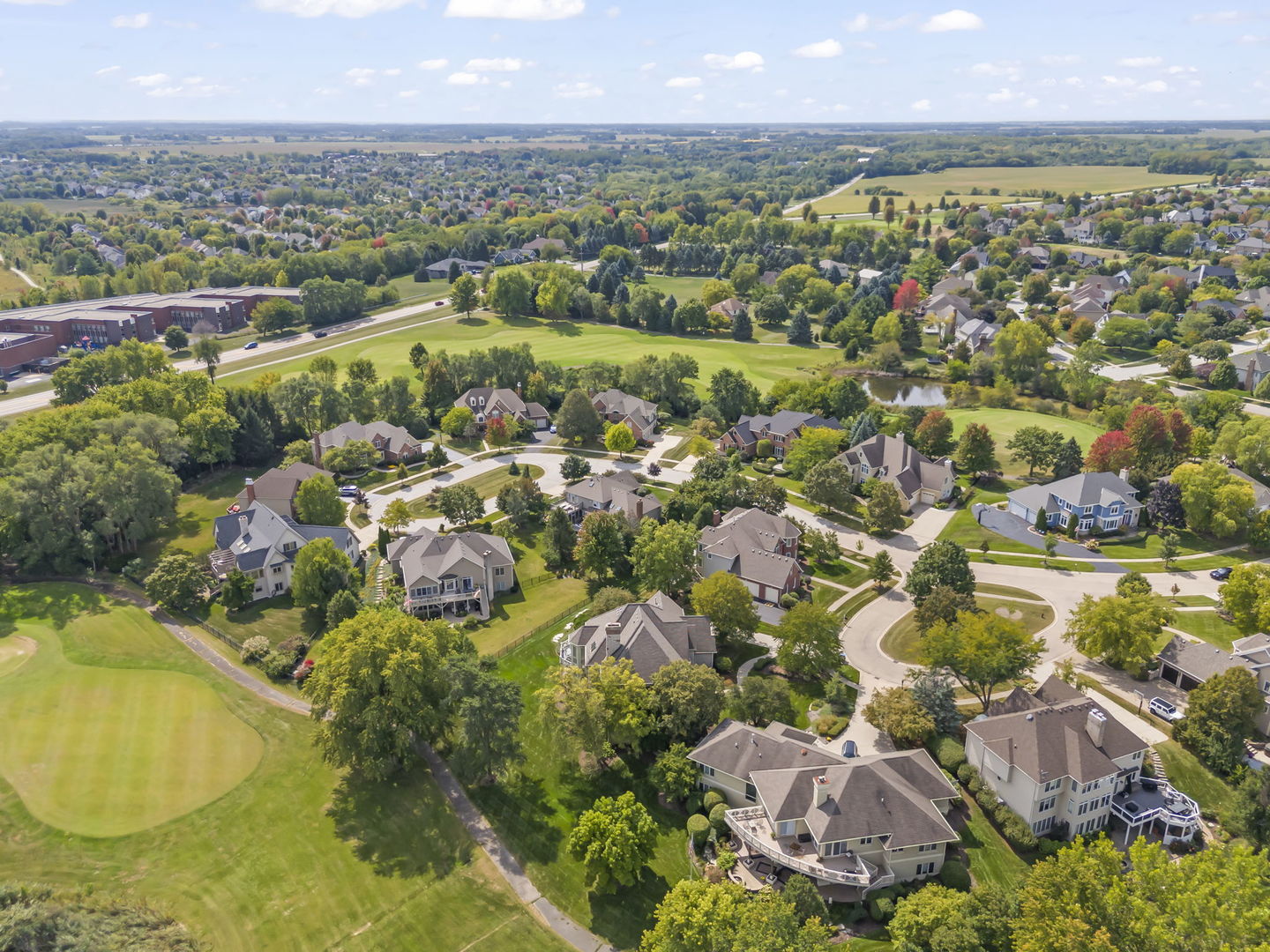 39W114 Fryendall Court Geneva, IL 60134 - Photo 47 of 76 an aerial view of residential houses with outdoor space and swimming pool