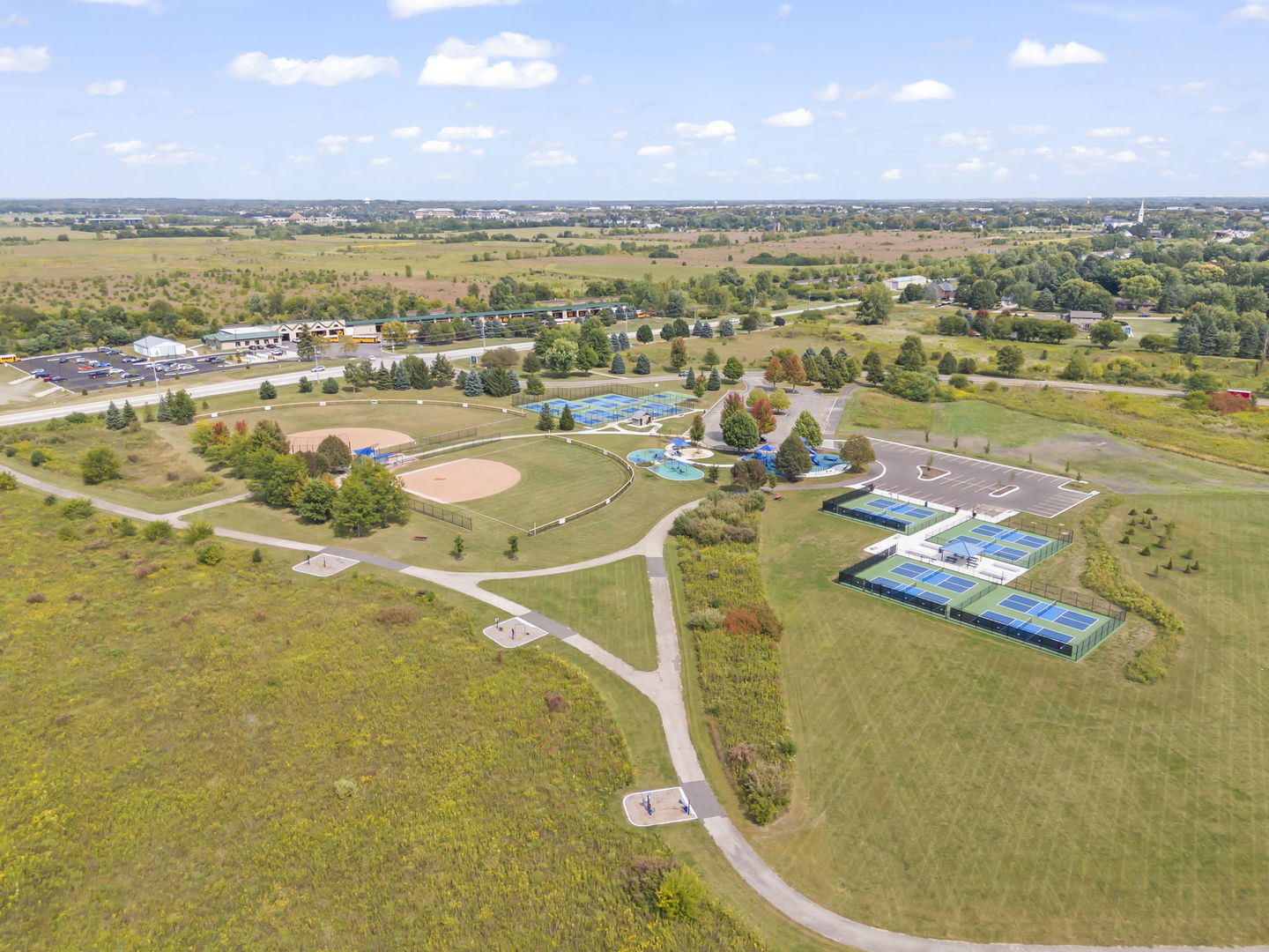 39W114 Fryendall Court Geneva, IL 60134 - Photo 49 of 76 a view of a swimming pool and an ocean view