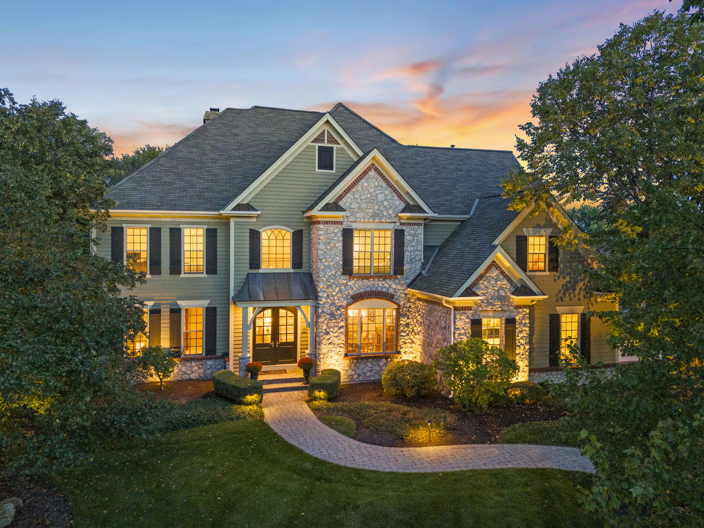 39W114 Fryendall Court Geneva, IL 60134 - Photo 58 of 76 a front view of a house with garden