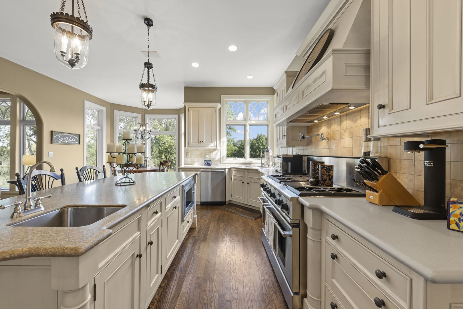 39W114 Fryendall Court Geneva, IL 60134 - Photo 9 of 76 a kitchen with stainless steel appliances a sink a stove and a wooden floors