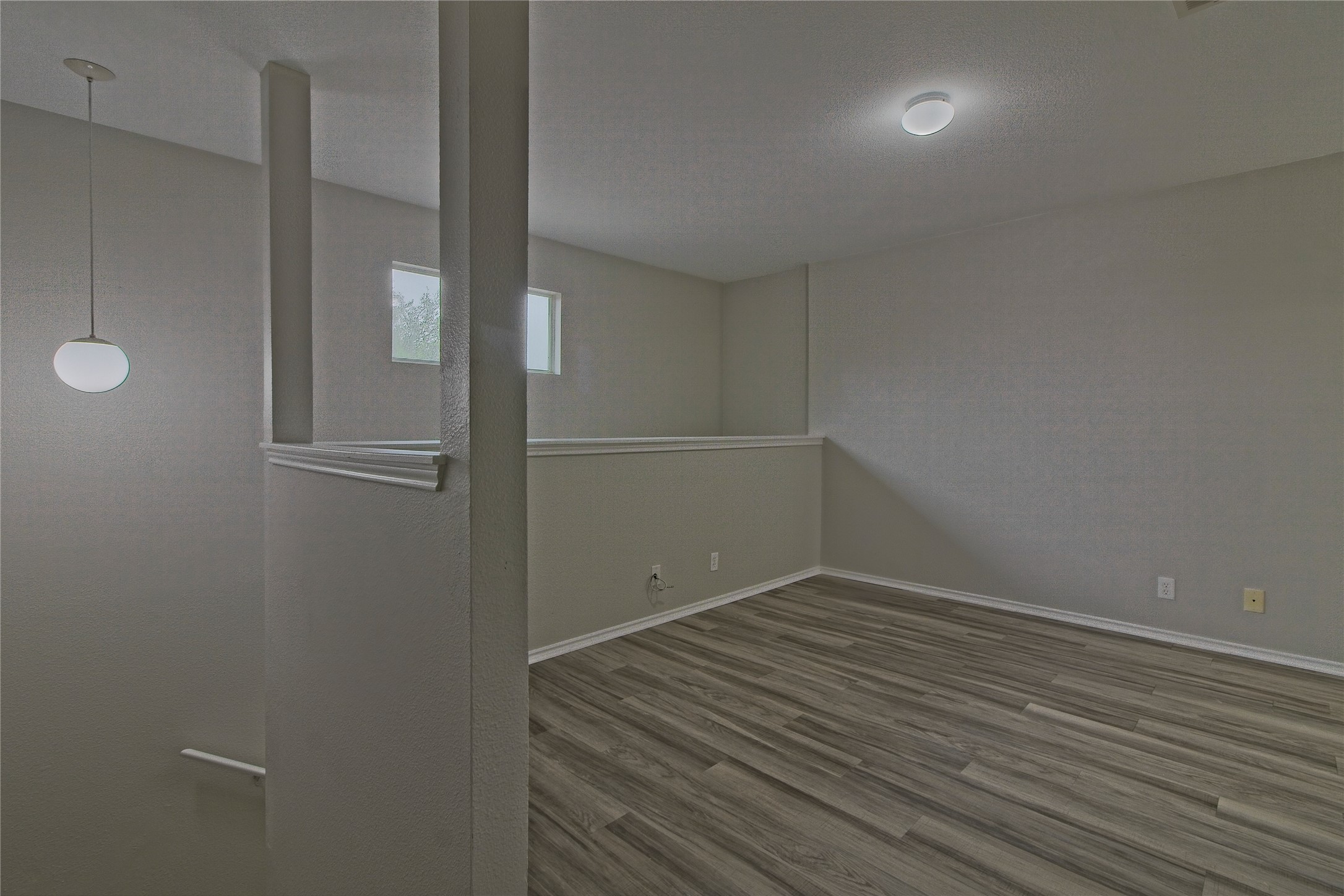 232 Brickyard Lane Jarrell, TX 76537 - Photo 20 of 31 A versatile open loft area provides additional living space.