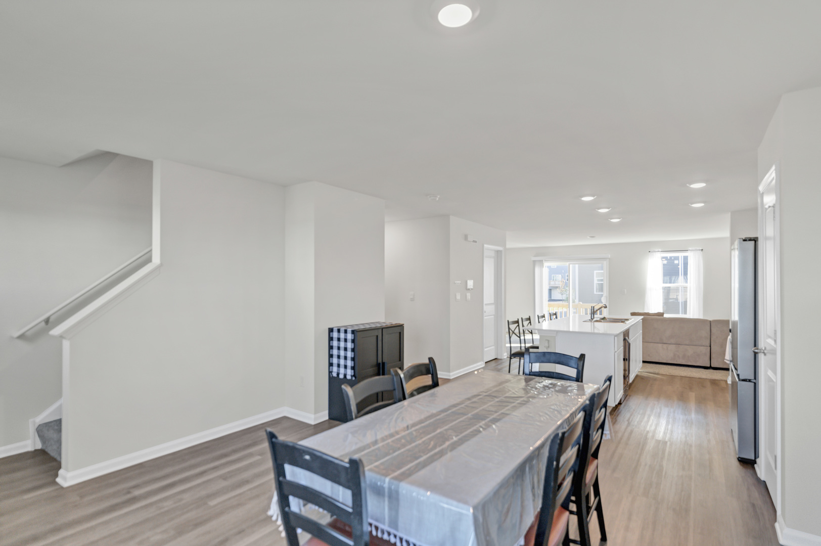 1464 Sequoia Way Hampshire, IL 60140 - Photo 12 of 31 a view of a dining room with furniture and wooden floor