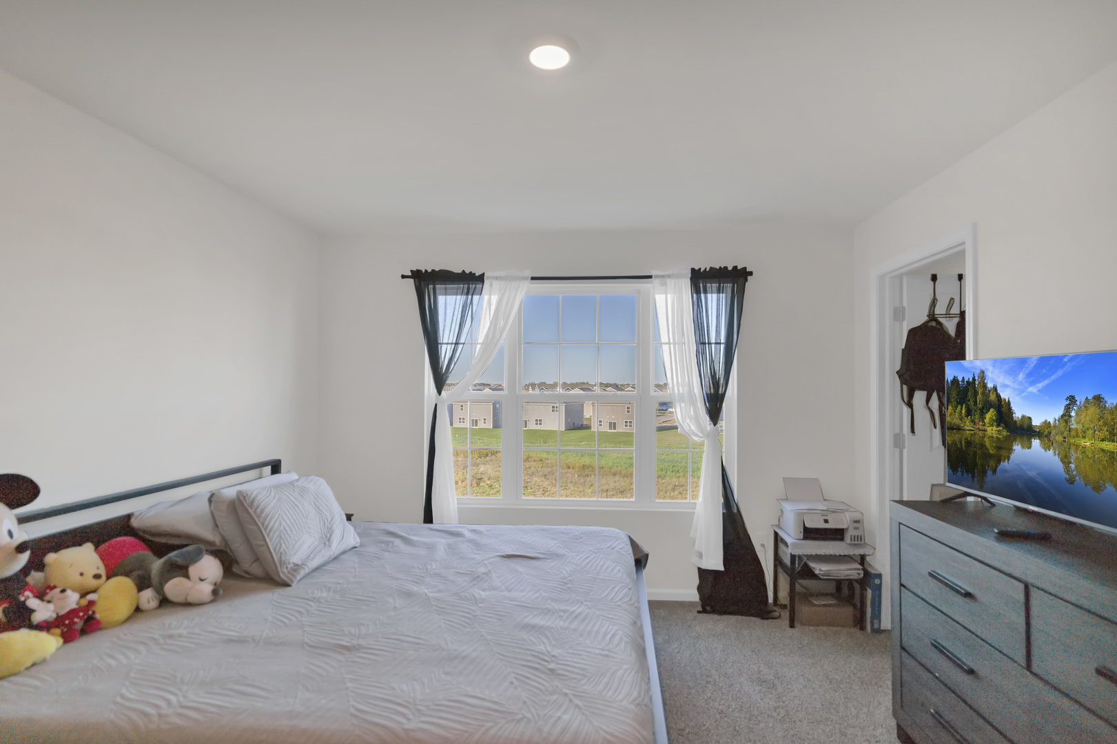 1464 Sequoia Way Hampshire, IL 60140 - Photo 18 of 31 a bedroom with a bed and a window