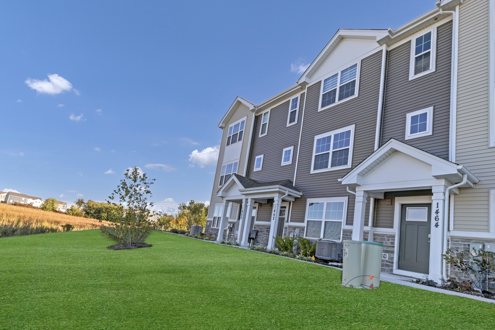1464 Sequoia Way Hampshire, IL 60140 - Photo 2 of 31 a front view of a house with a yard