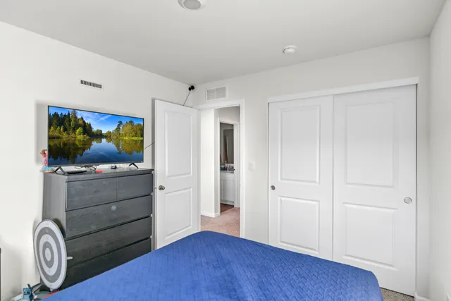 a view of a livingroom with wooden floor