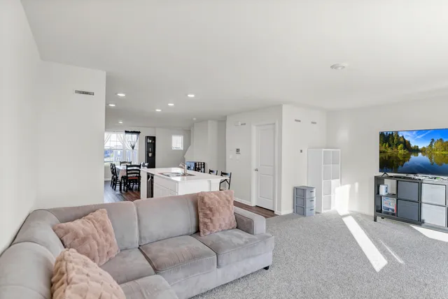 a living room with furniture and a couch