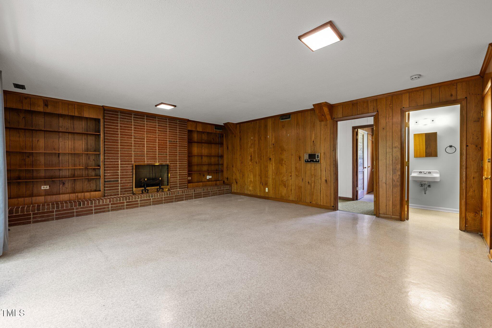 1024 Chalmers Street Durham, NC 27707 - Photo 22 of 41 a view of an empty room with closet and a window