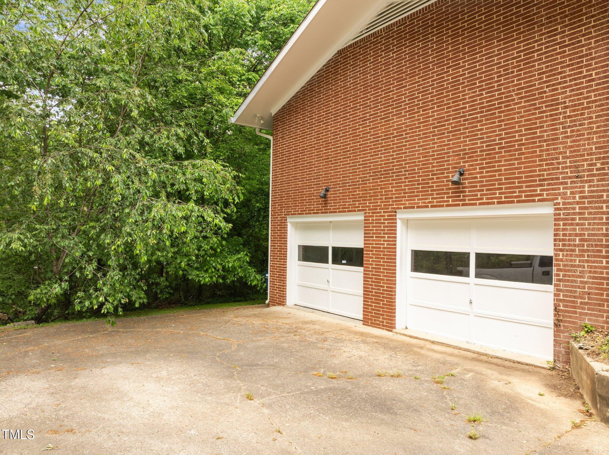1024 Chalmers Street Durham, NC 27707 - Photo 38 of 41 a view of house with backyard and garden