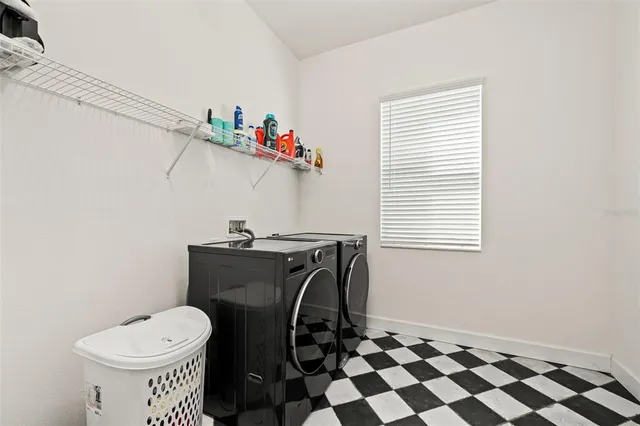 a view of a porch with a floor to ceiling window and yard