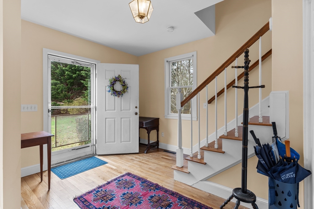 376 Pleasant Bay Road Harwich, MA 02645 - Photo 2 of 17 a view of entryway with wooden floor and door